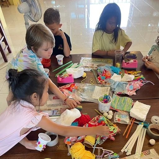 How to Prepare Your Child for Kindergarten Young child participating in a learning activity at Shining Stars School Kamala in Phuket