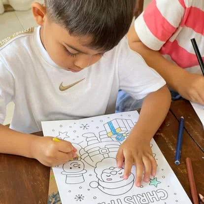 Child preparing for kindergarten at Shining Stars School Kamala