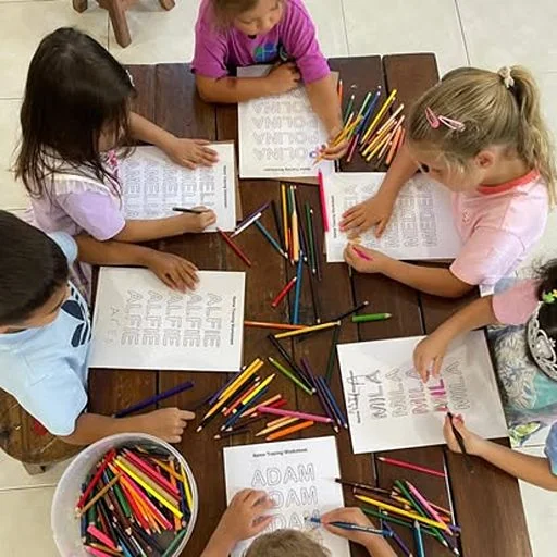 Children enjoying positive learning experiences at Shining Stars Kindergarten Kamala
