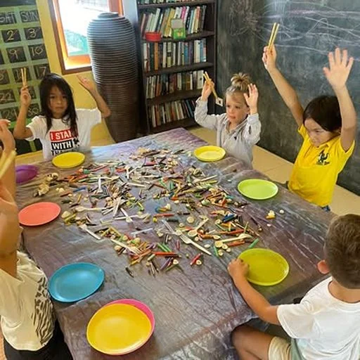 Children learning through sensory play at Shining Stars School Kamala