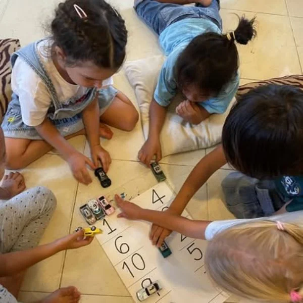 Children learning through play at Shining Stars School Kamala